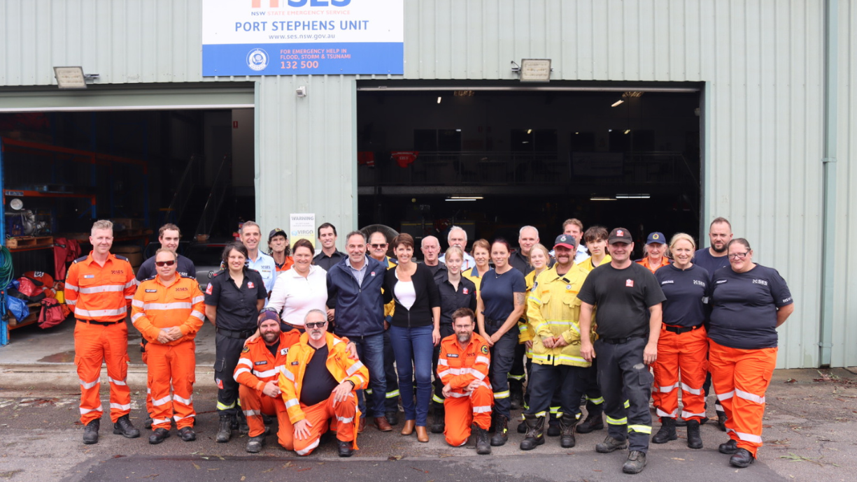 Member group photo in front on Port Stephens Unit