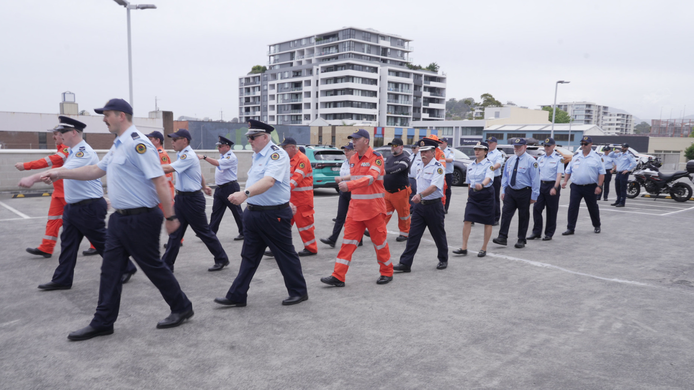 NSW SES members in line marching outside